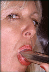Granny Sucking Her Dildo